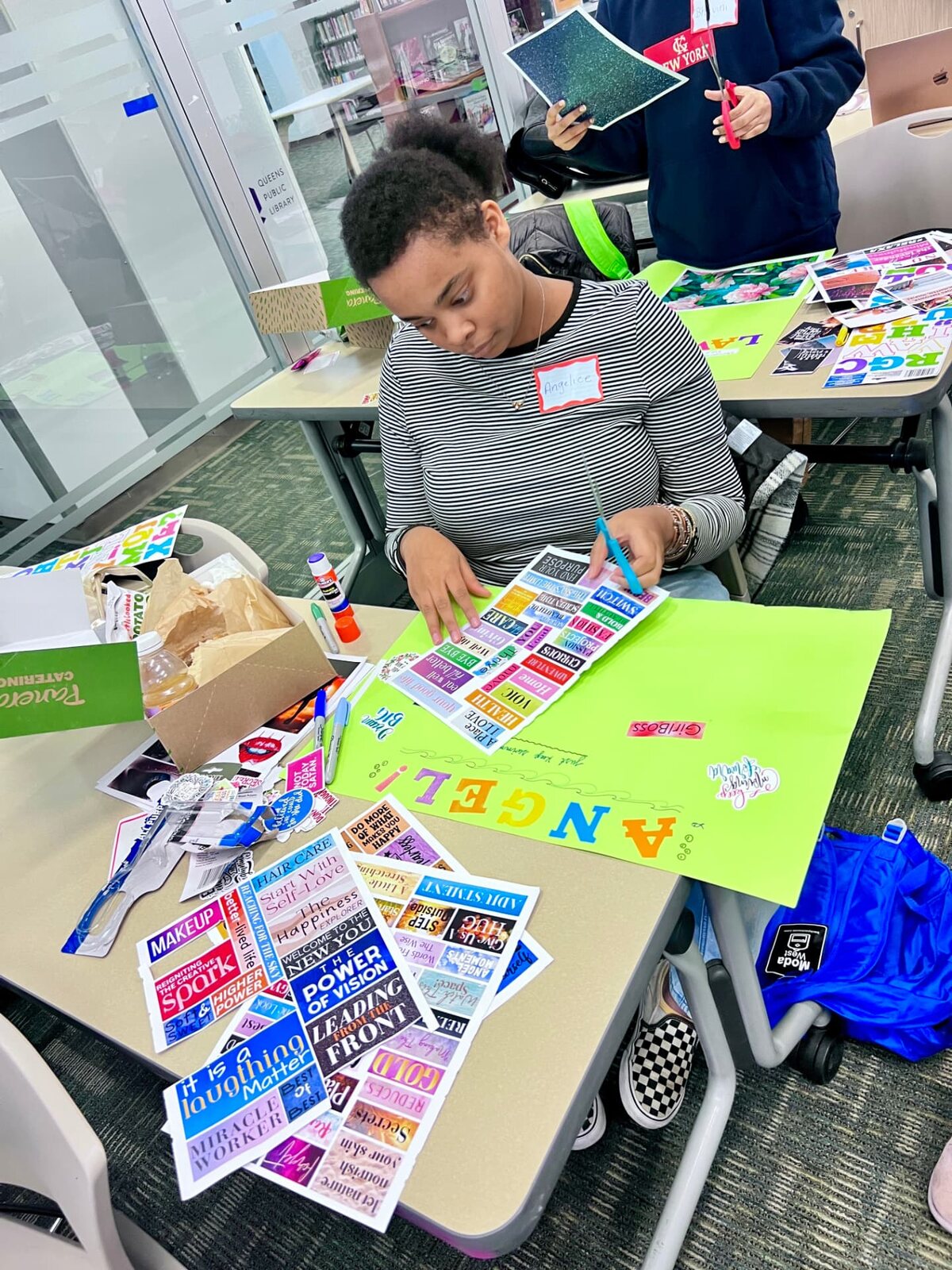 Cutting out words for a vision board