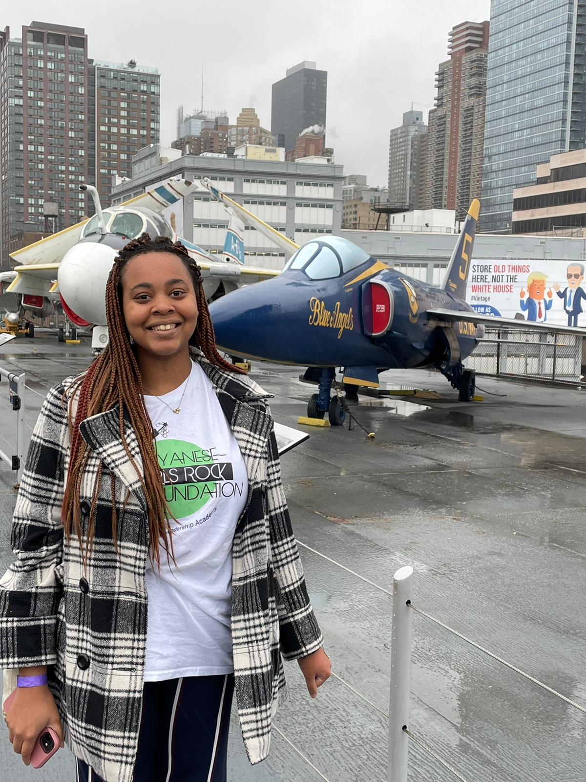 On the Intrepid flight deck by the Blue Angels jet