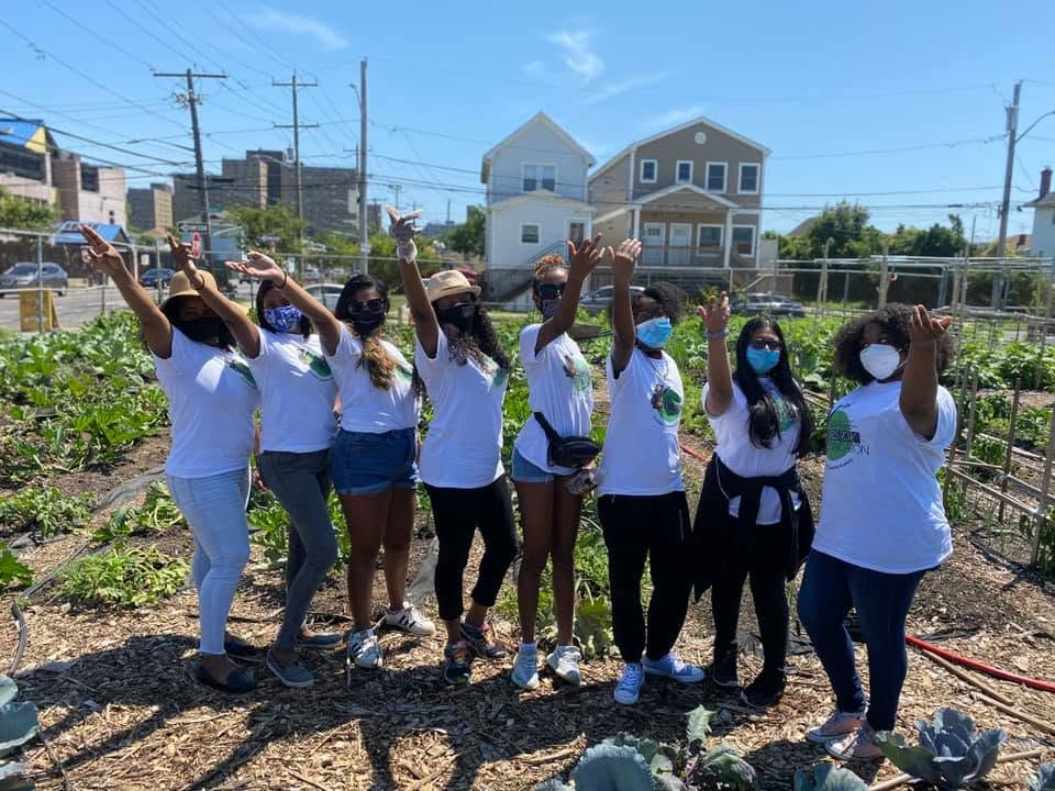 The group together in the community garden