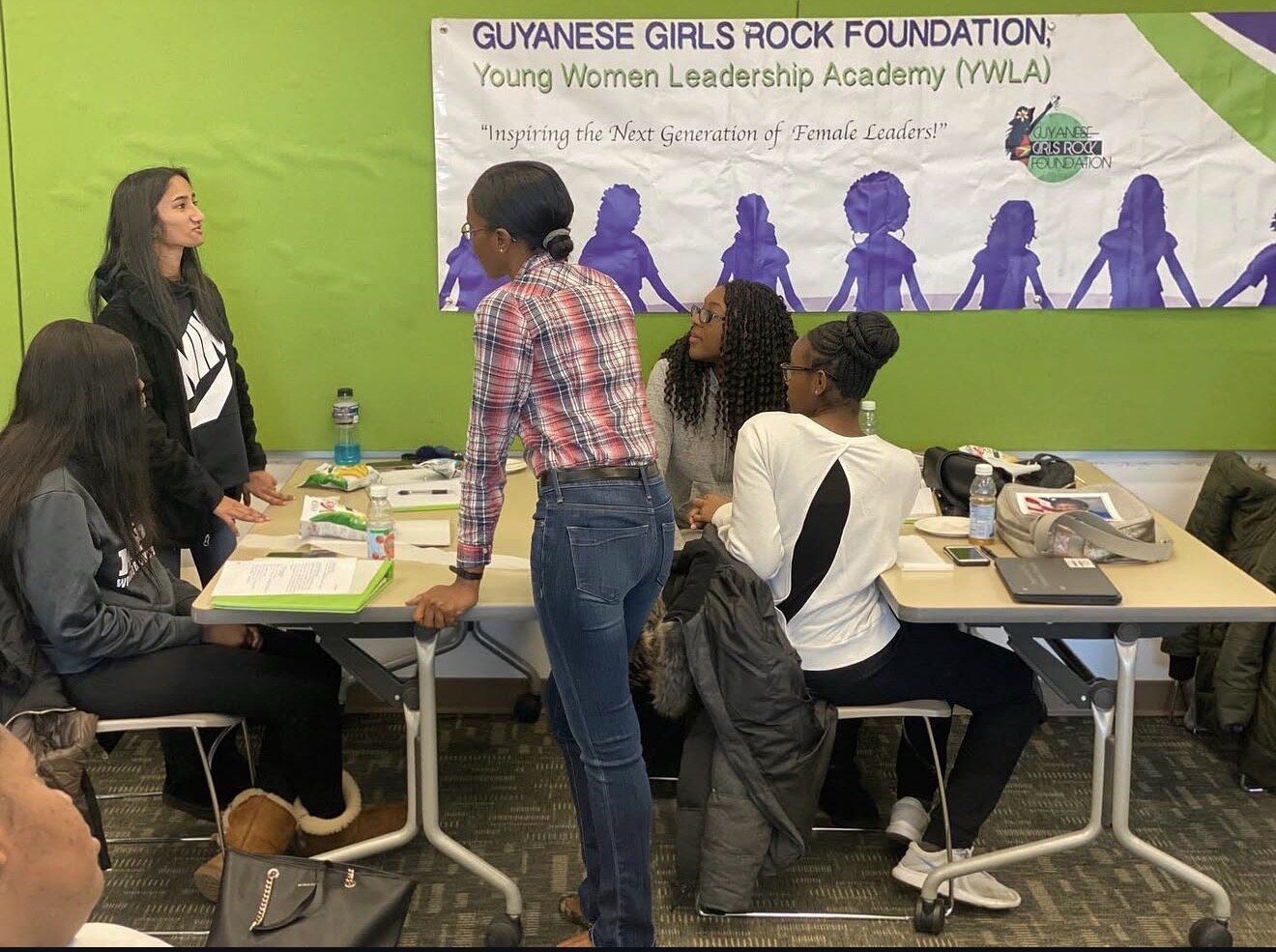 Leading a discussion at a YWLA workshop