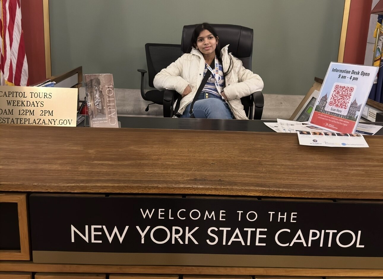 At the information desk of the New York State Capitol