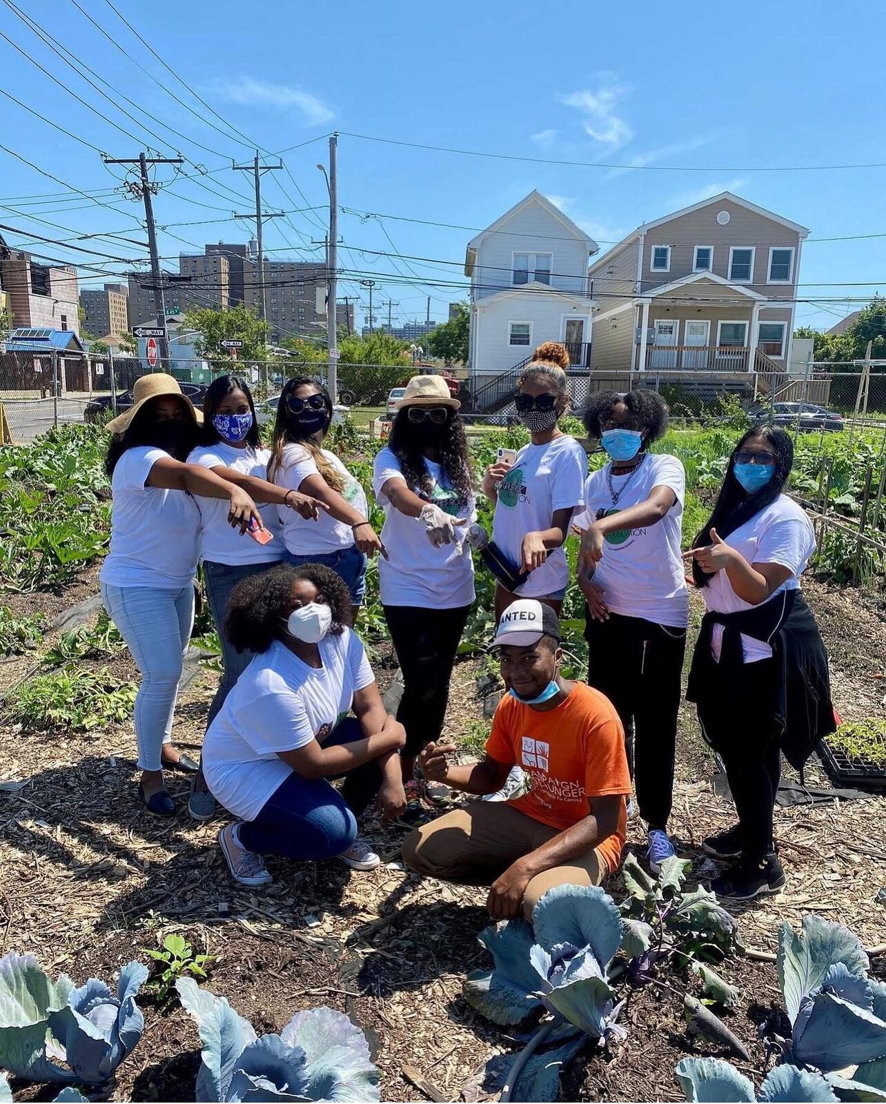 Garden volunteers in foundation tees