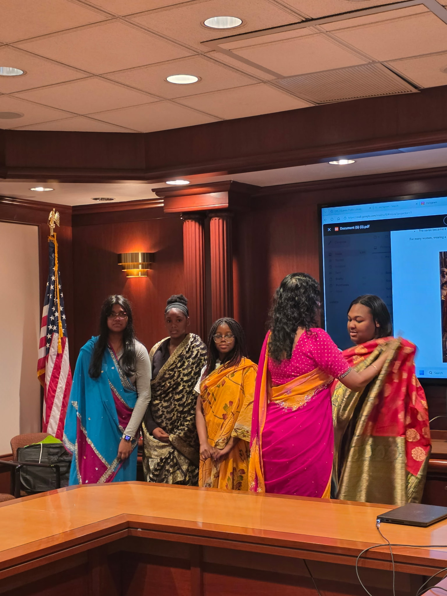 Learning to drape a sari together